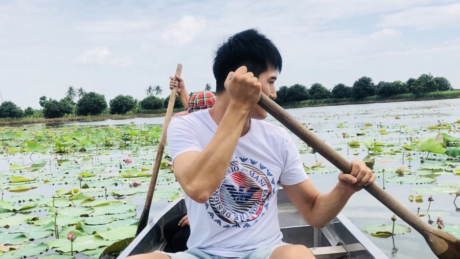 Boating in lotus farm
