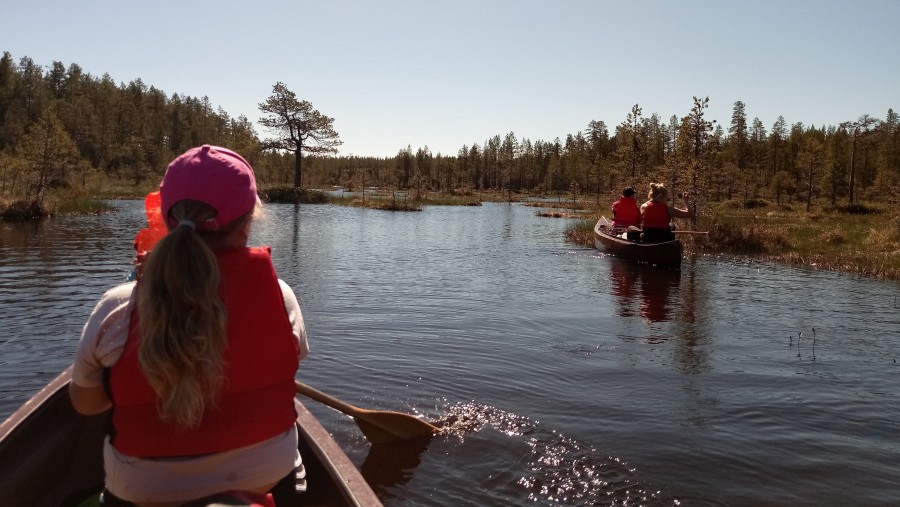 Canoeing in a remote lake in Posio, Finland
