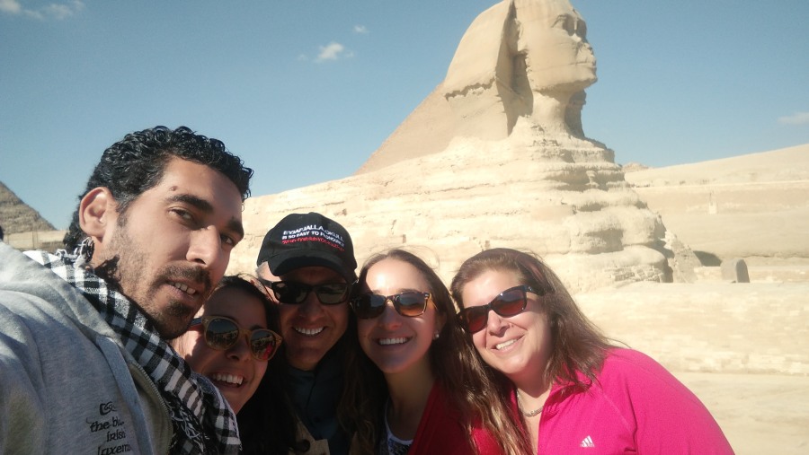 Happy tourists with guide