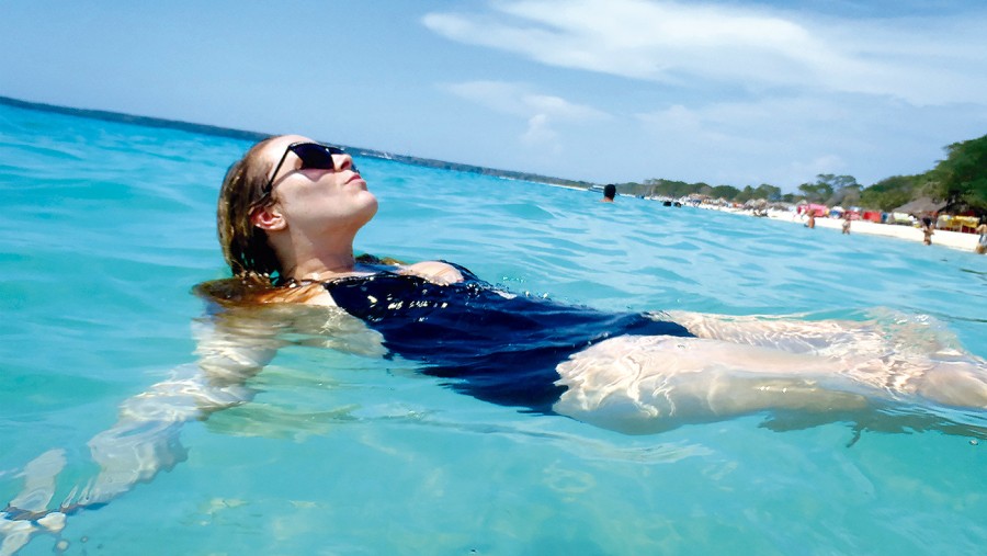 Float in the crystal clear waters of the island