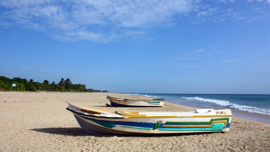 Walk on deserted the Nilaveli Beach in Trincomalee in Sri Lanka