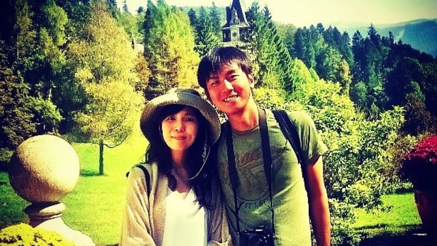 Japanese tourists charmed by our amazing mountain landscape, with Peles Castle in the background