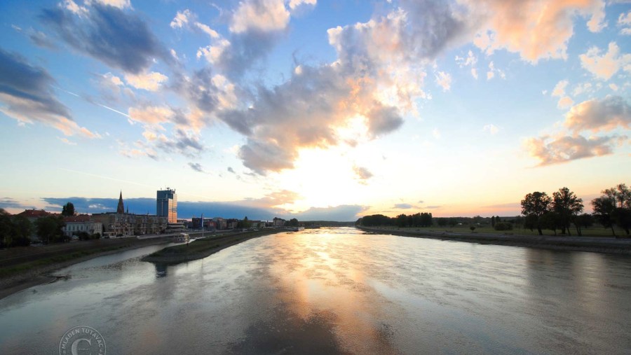 Sunset, view from the pedestrian bridge over Drava river