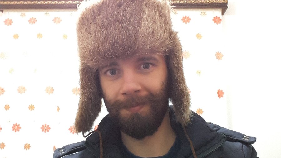 wearing a russian hat