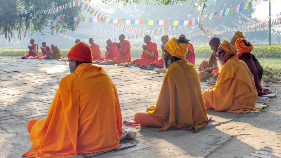 Monks and Saints meditating at the Mayadevi Temple Premises
