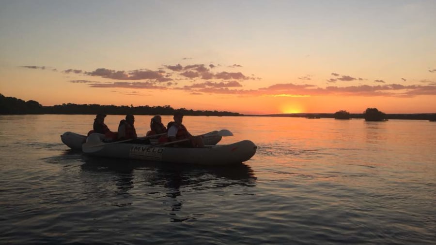A zambezi sunset on a float raft.