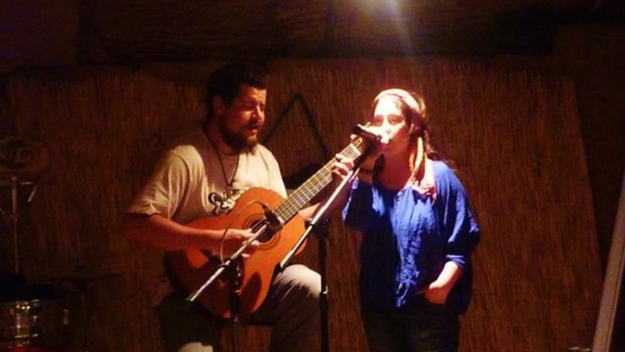 Singing in a bar with a friend