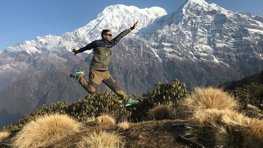 Enjoying with intoxicated nature during the Mardi  Himal Trek, on the background Mt. South annapurna(7219m.) and Mt. Hiunchuli(6441m.)