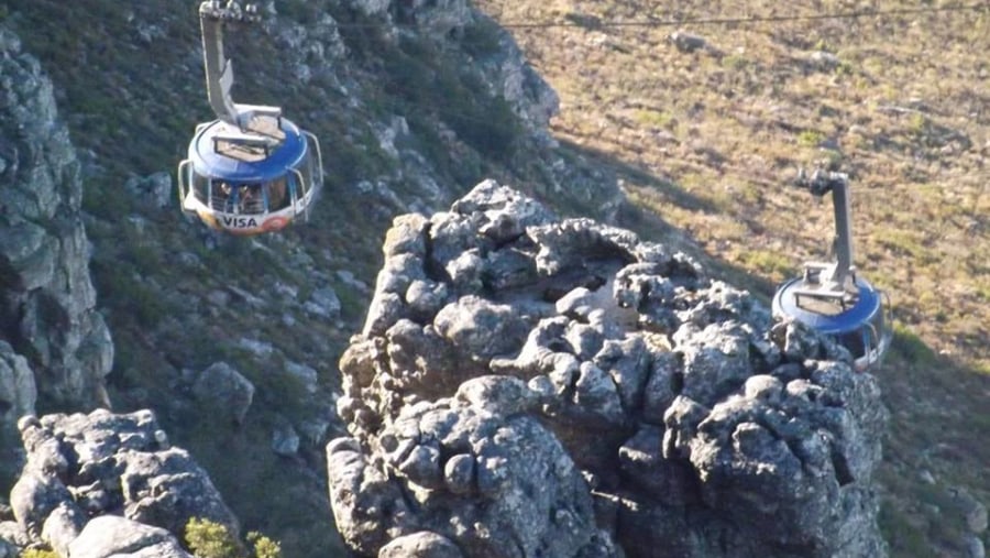 Cable cars carrying 65 people apiece,the equivalent of two double decker busses!!! Table Mountain!!!