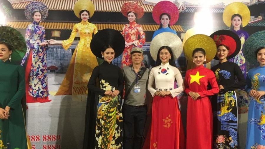 With Vietnamese traditional dress - Ao Dai