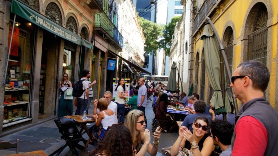 stone street in the historical and financial center of the city_Happy Hour after work