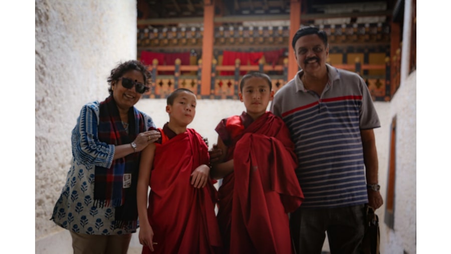 With Bhutanese monk at Punakha fortress 