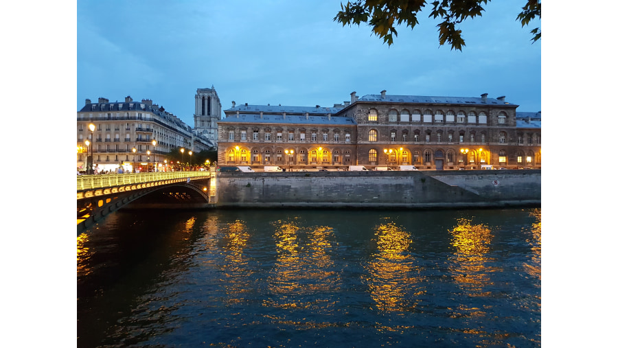 Île de la Cité, the centre of Paris, the location where the medieval city was refounded, is one of two natural river islands in the Seine. Hôtel-Dieu, Hospital of Paris & the towers of Notre-Dame, Cathedral of Paris.