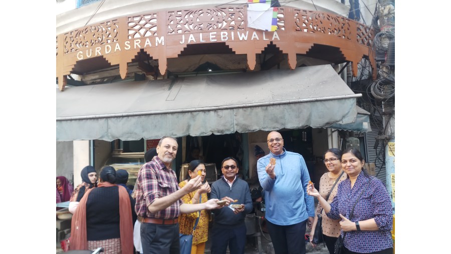 Guests from USA enjoying Jalebis in Amritsar.