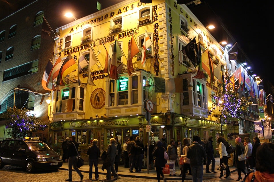 Bustling crowd at night in Dublin