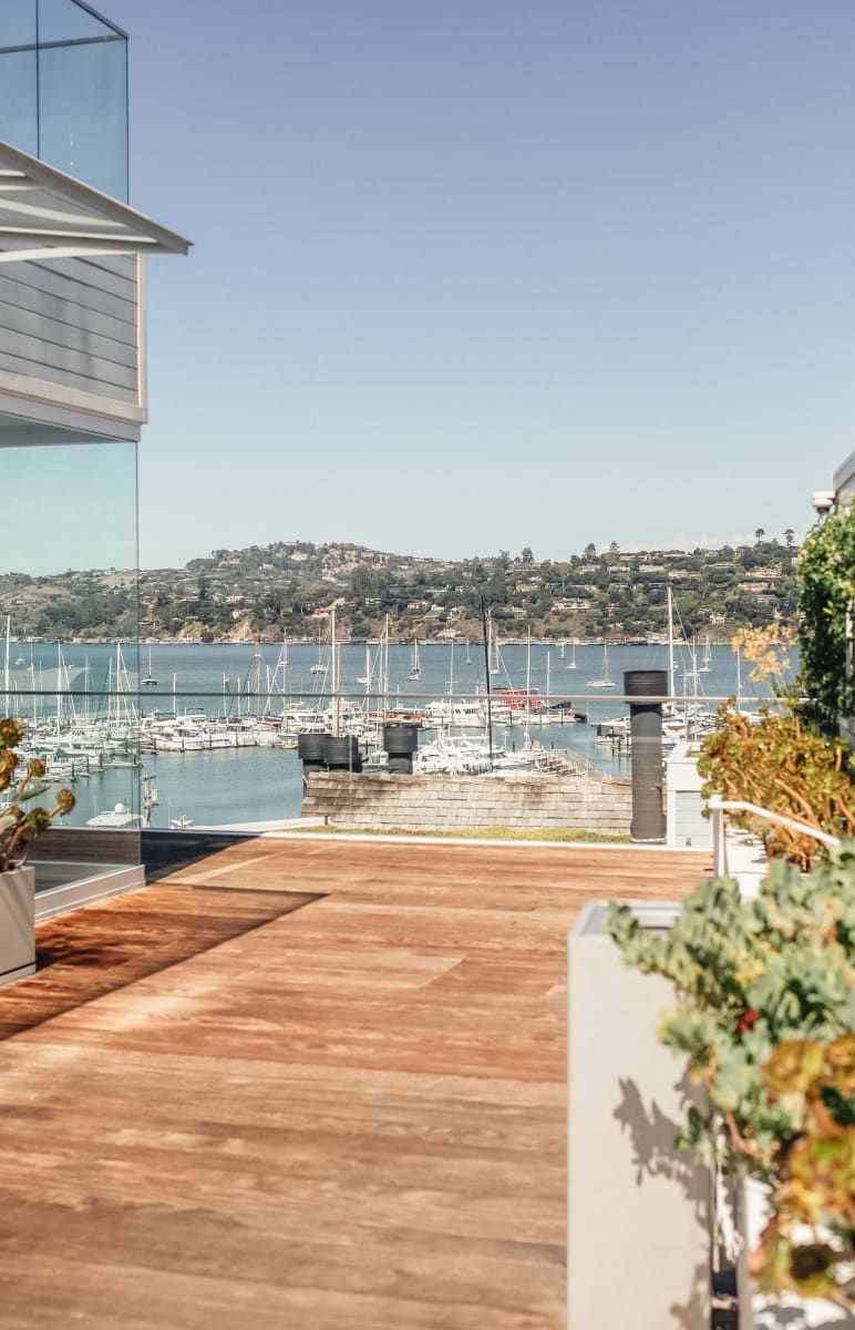 Sun deck overlooking harbor with boats