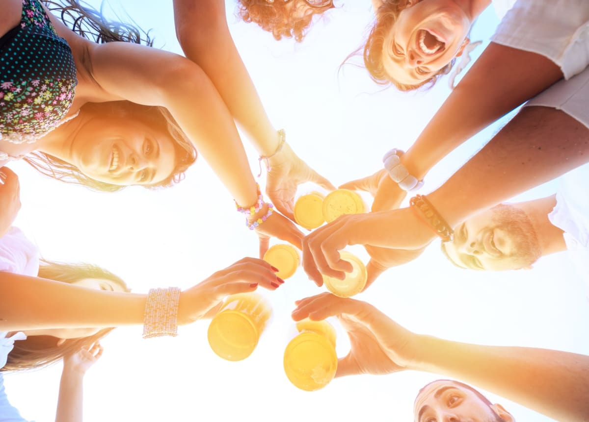 Happy group of friends toasting