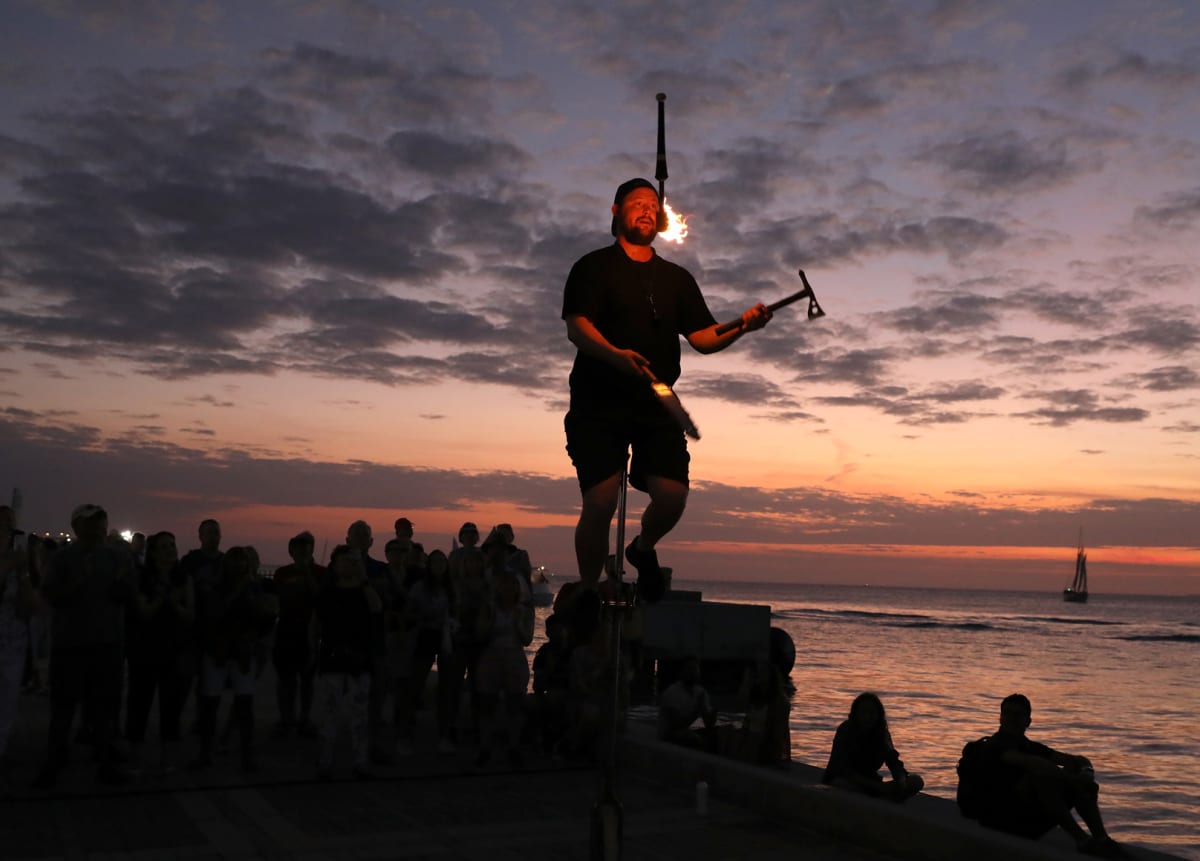 fire eater on sunset