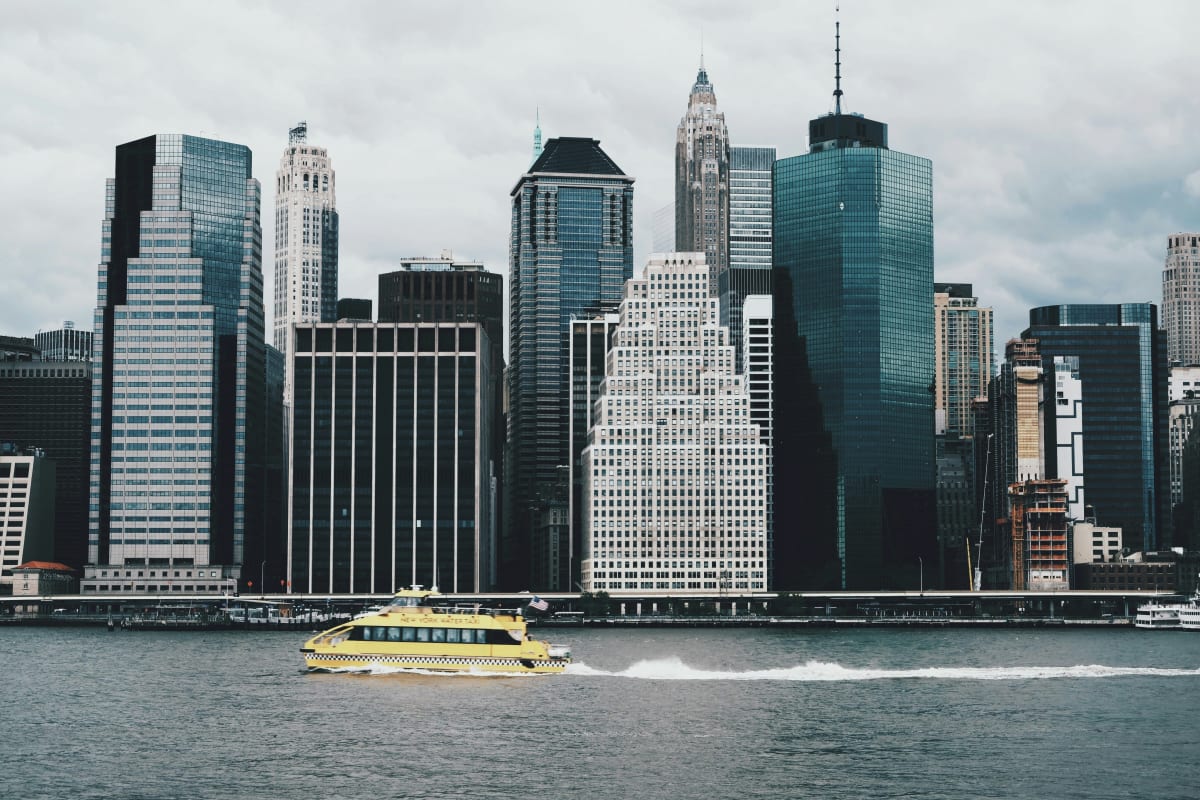 Ferry in front of the manhattan skyline