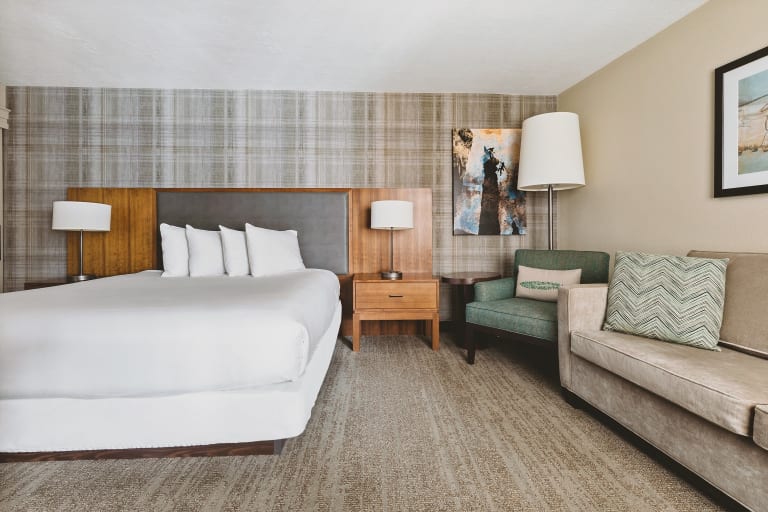 king bed with couch and chair