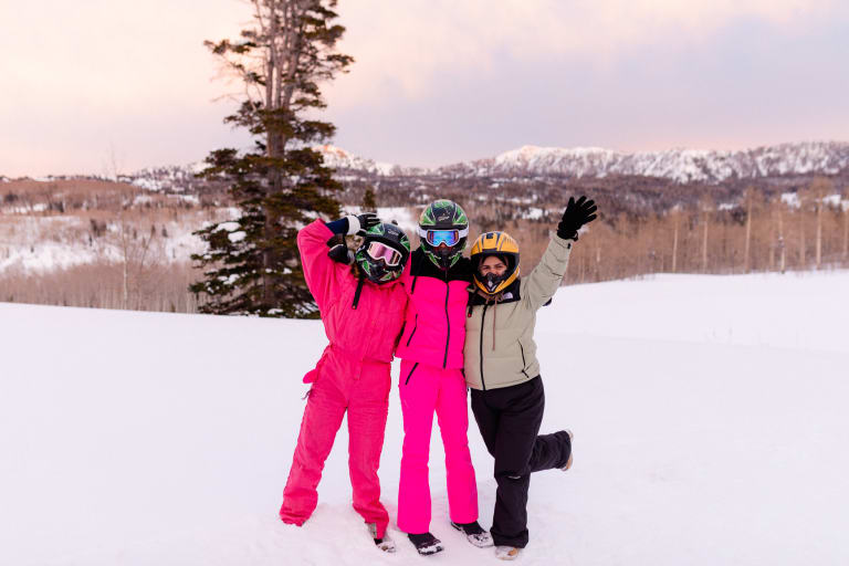 three women on snow covered mountain