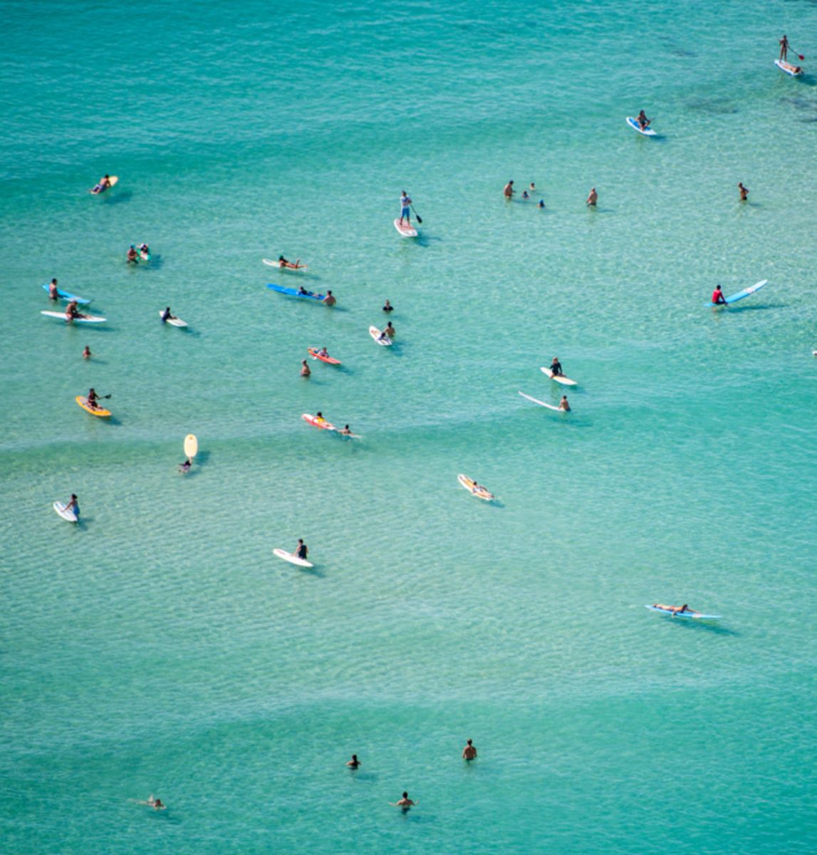 surfers-on-water