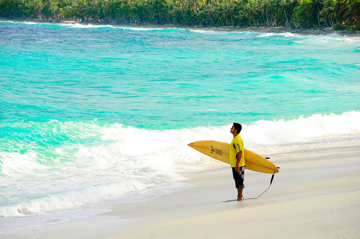 Canva - Person Holding Surfboard-credit-Ibrahim Asad from Pexels