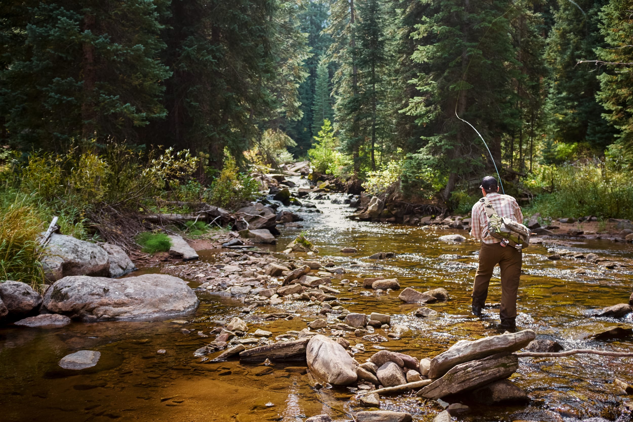 man fly fishing