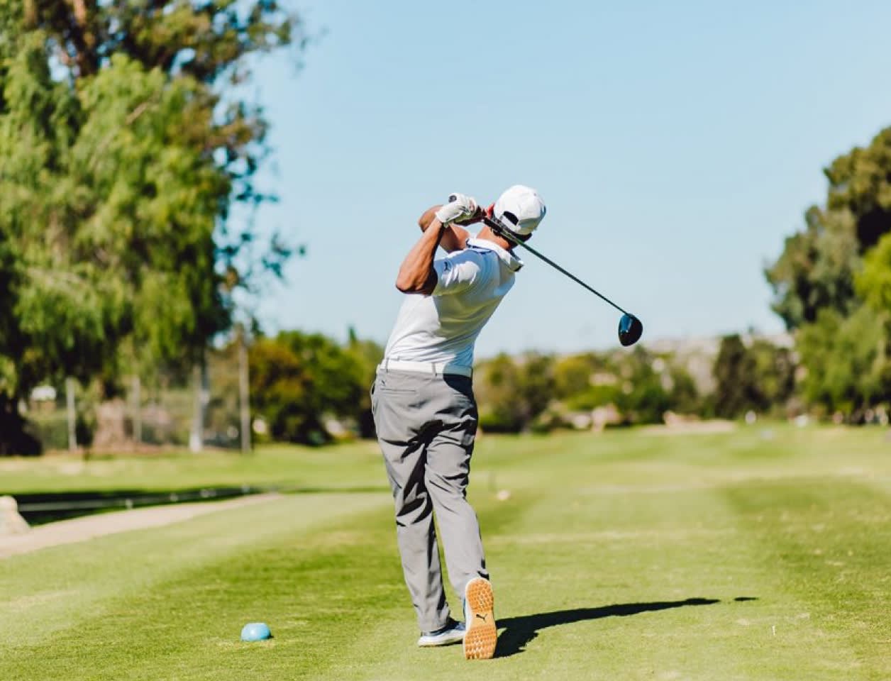 man golfing