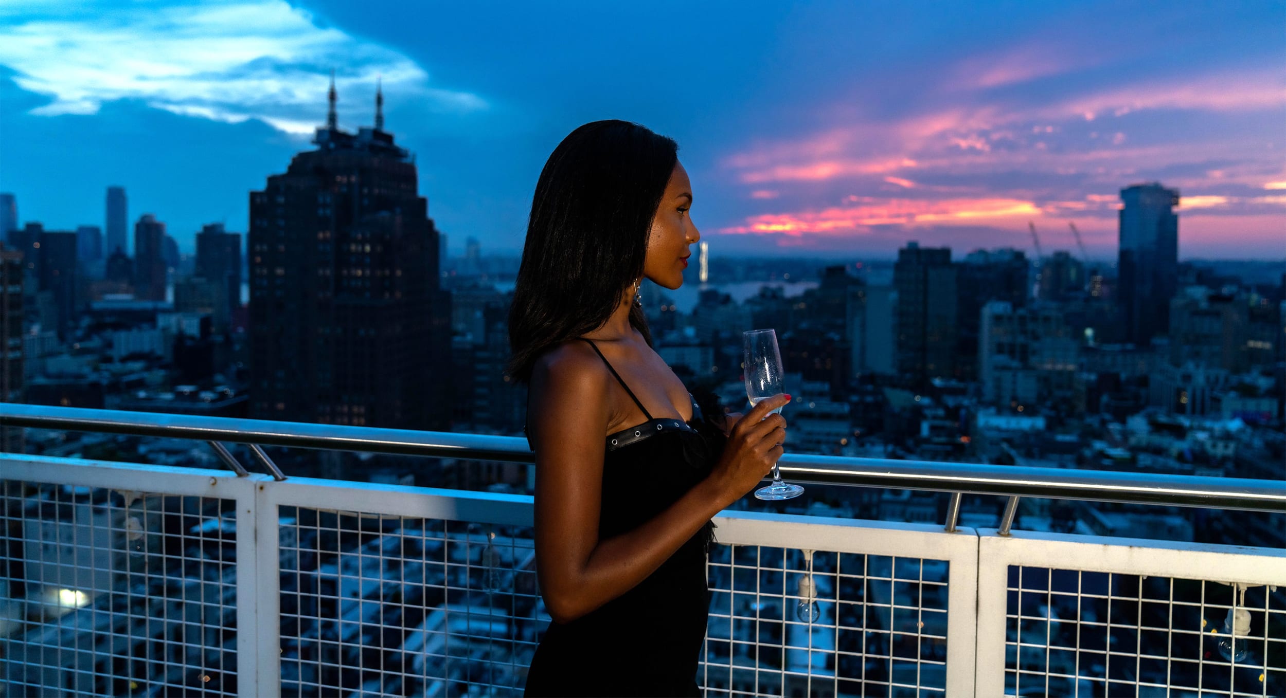 Women drinking in sunset