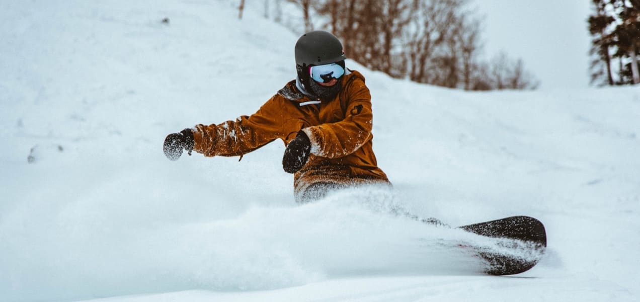 man snowboarding