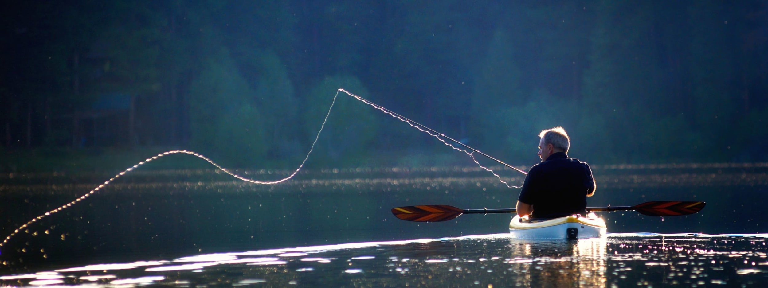 man-fishing-from-kayak