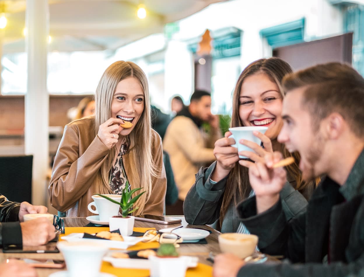 group-of-friends-drinking-at-cafe