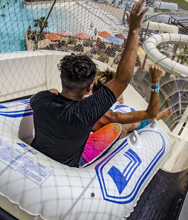 waves-resort-waterpark-child-tubing-down-slide