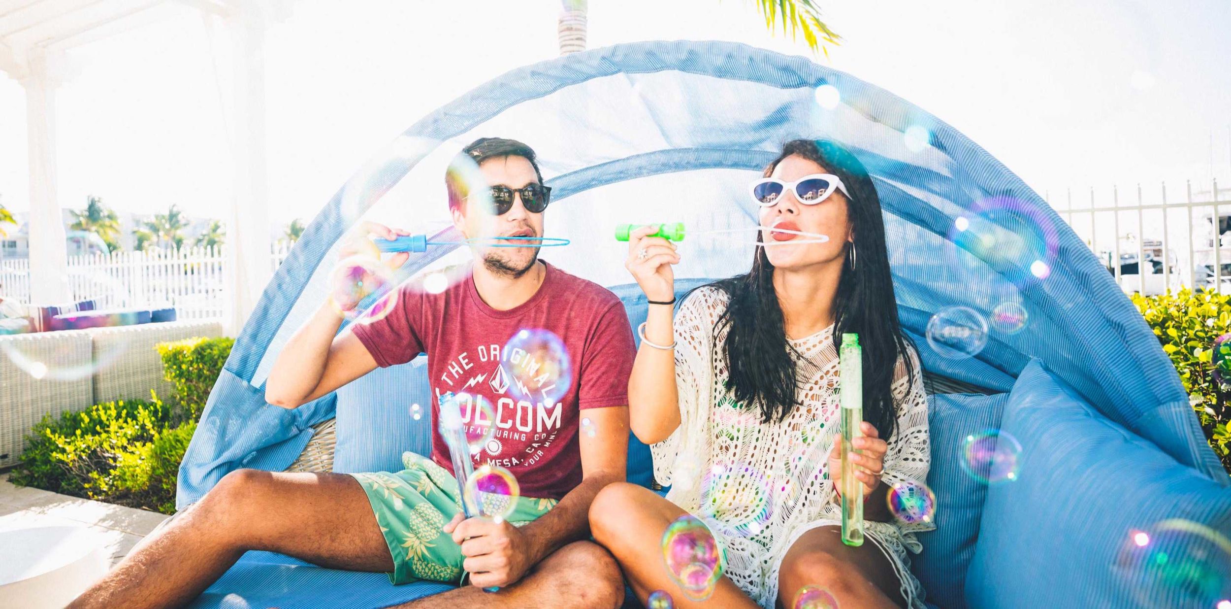 Couple blowing bubbles