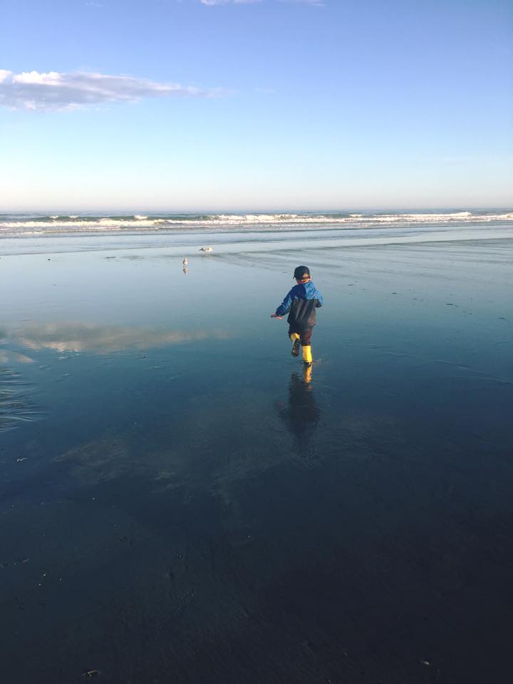 child running on beach