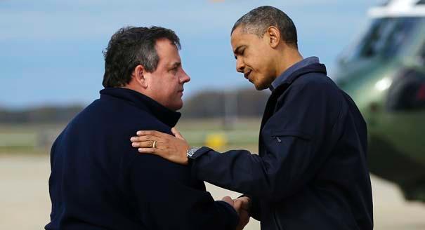 President Barack Obama is greeted by New Jersey Gov. Chris Christie upon arrival at Atlantic City International Airport in Atlantic City, N.J., to visit areas damaged by Superstorm Sandy.
