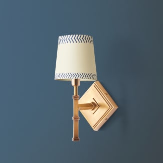 Single Astor wall fixture in antiqued brass