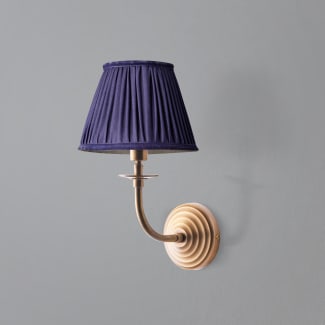 Pringle wall fixture in antiqued brass