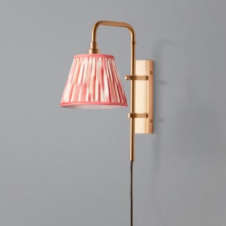 Tiree wall fixture in antiqued brass with external flex in olive green