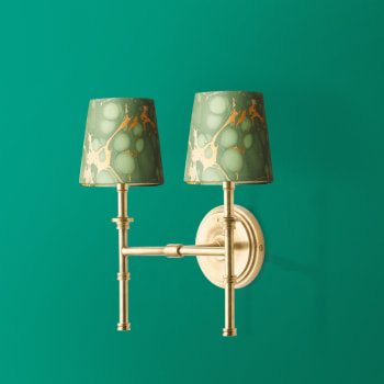 Double Chukka Wall fixture in antiqued brass