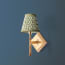 Single Astor wall fixture in antiqued brass