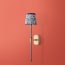 Besidem wall fixture in antiqued brass