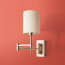 Cagney Wall fixture in antiqued brass
