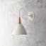 Cone wall fixture in stone