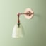 Mumford wall fixture in antiqued brass