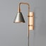 Tiree wall fixture in antiqued brass with external flex in olive green