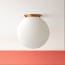Larger Plumb flush mount fixture in antiqued brass