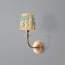 Pringle wall fixture in antiqued brass