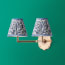 Double Insignia cordless wall fixture in antique brass
